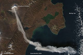 NASA's Aqua satellite captured this image on Oct. 6, 2012, which shows a plume spewing forth from Russia's Shiveluch volcano and drifting away in the wind, in the span of just two hours. 