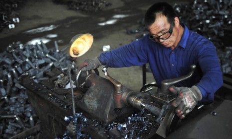 A worker at a car parts plant in Shenyang, China: Europe&amp;#039;s debt crisis has hurt China&amp;#039;s exports by kneecapping one of the most reliable markets for Chinese goods.