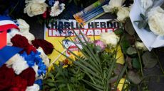 Tributes placed outside the former offices of Charlie Hebdo in Paris, in memory of victims of the 2015 terror attack