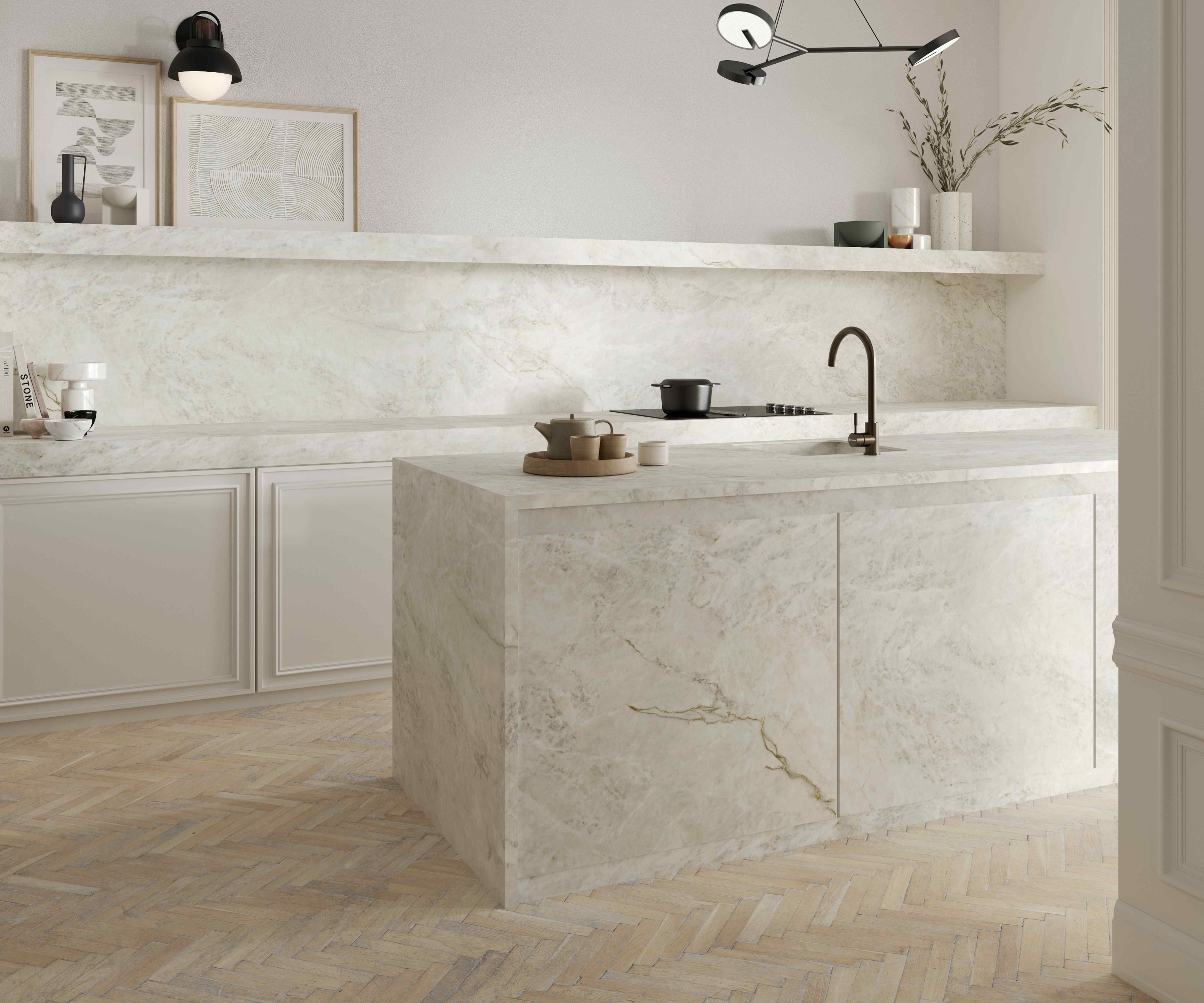modern white and marble kitchen with 3 armed black pendant light above island with sink