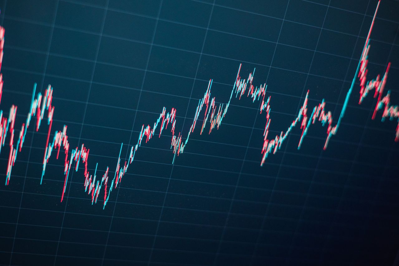 closeup of black stock chart with red and green bars