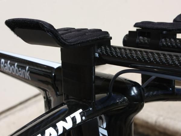 Extension height is adjusted by adding or removing spacers.