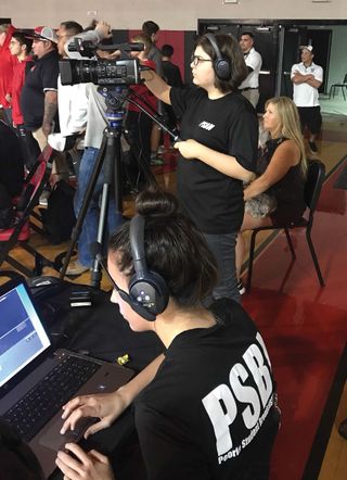 Students producing a Wrestling Tournament. Students work as camera operators, graphic boards, TriCaster Operators, and Producers to develop a show for the community and the state of Arizona.