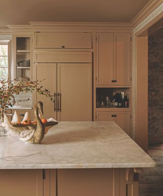 kitchen in neutral colours with marble countertop