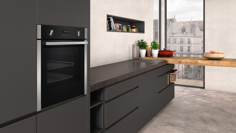 A modern minimalist kitchen containing the best oven 