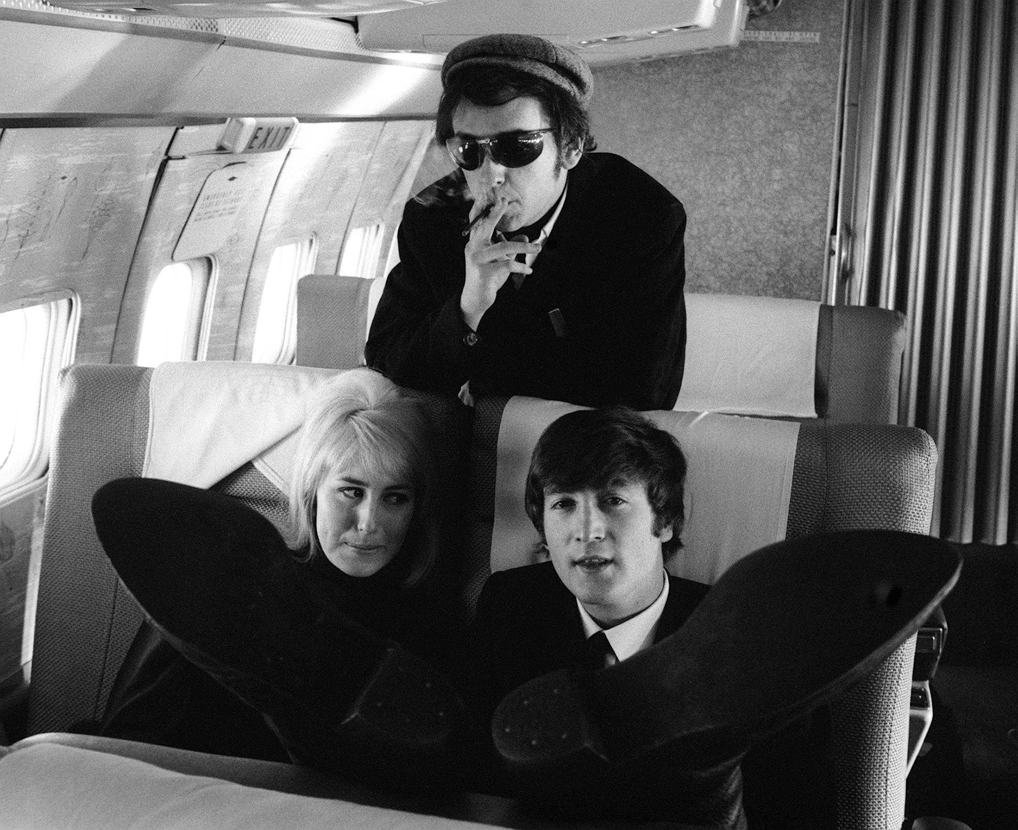 John Lennon, Cynthia Lennon &amp;amp; recording manager Phil Spector travel to New York. 7th February 1964.