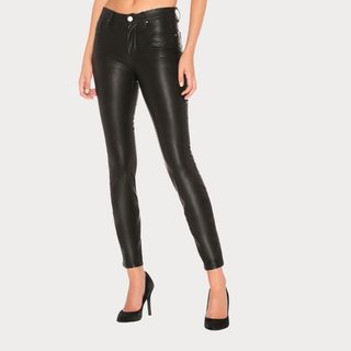 Flat lay image of woman wearing leather trousers