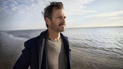 Mature man on the beach.