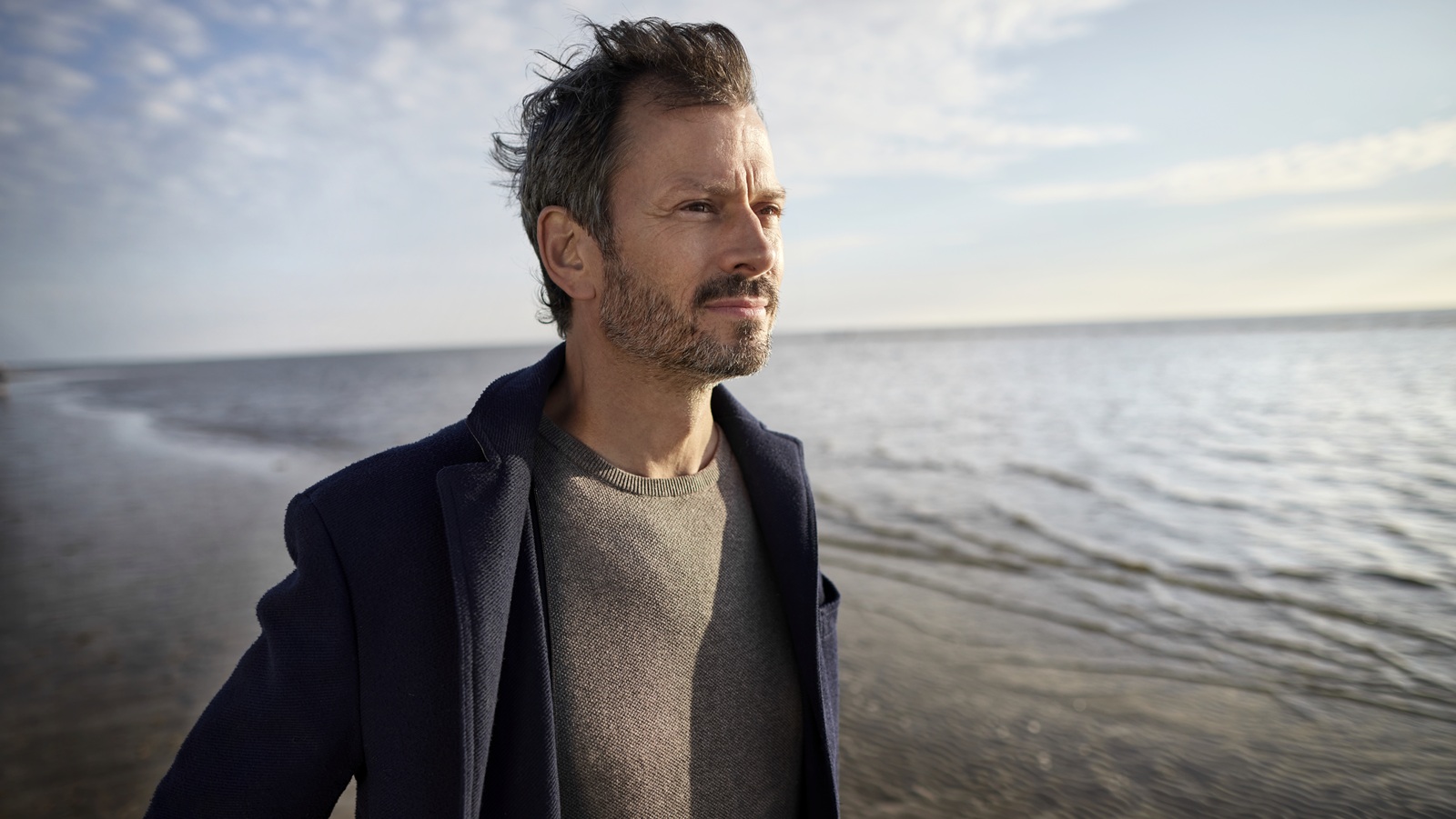 Mature man on the beach.