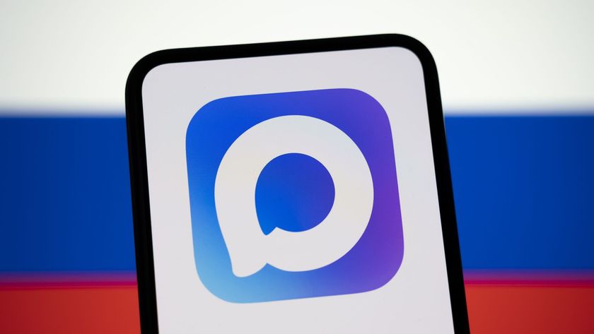 The Max logo appears on a smartphone screen with the Russian flag in the background