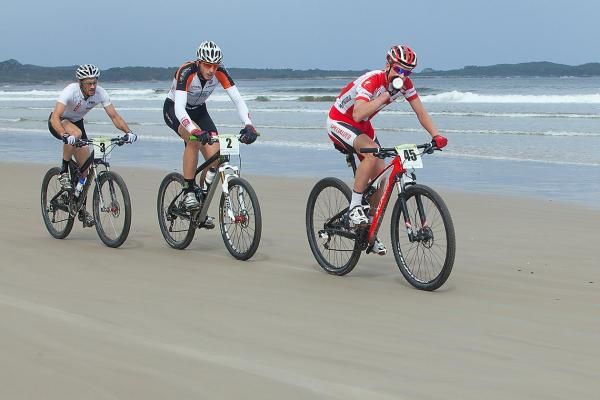 The contenders hit top sepeed on Ocean Beach yesterday with Canadian champ Max Plaxton (45) leading Paul van der Ploeg and Sid Taberlay.
