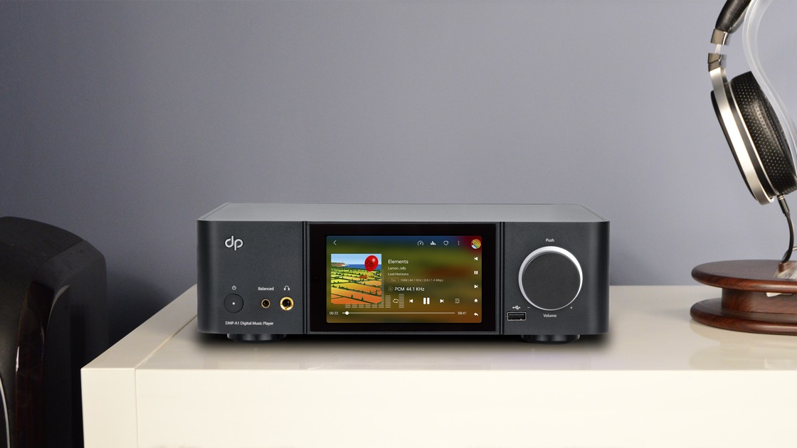 The Dorpo DMP-A1 on a side unit next to a pair of over-ear headphones on a stand.