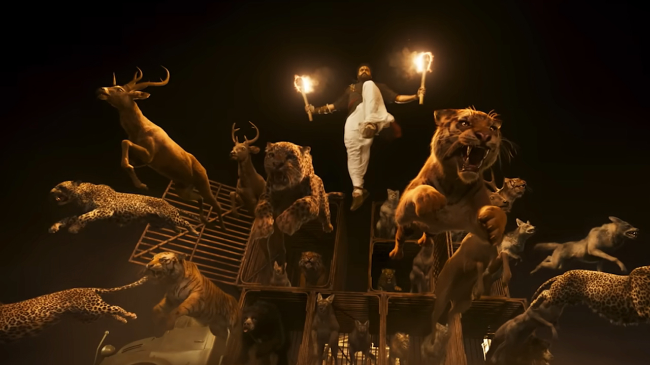 A man with two torches jumping out of a truck with many animals jumping out with him