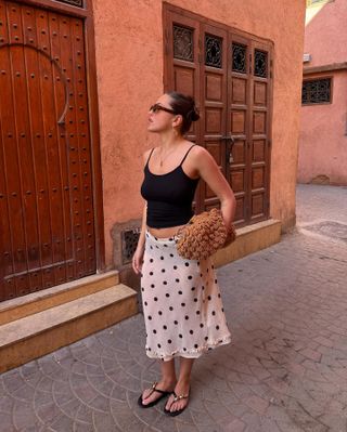 Influencer wears a polka dot skirt