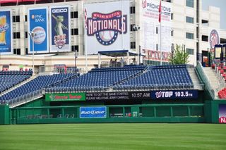 In a stadium or arena, screen space can be a valuable asset—advertising might take up every spare pixel—but the captioning still needs a spot that is visible, like it is here at Nationals Park.