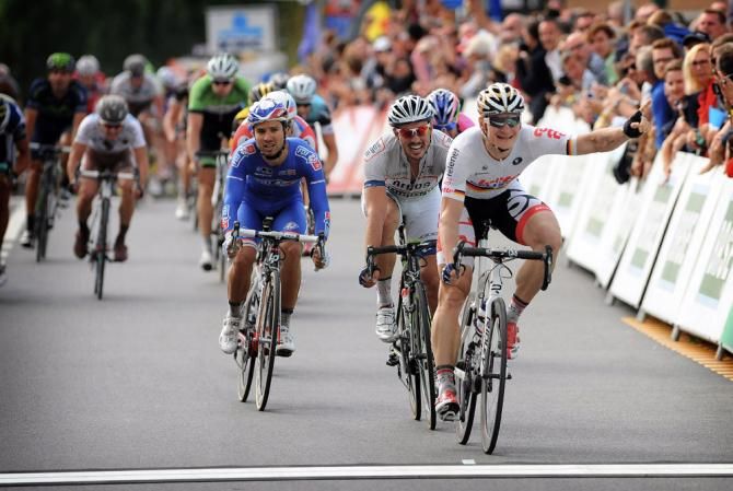 Andre Greipel (Lotto Belisol) celebrates victory in the inaugural edition of the Brussels Cycling Classic