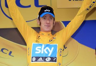 Tour leader Bradley Wiggins in yellow with two stages remaining