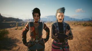 Cyberpunk 2077 screenshot of V and Panam smiling and posing together