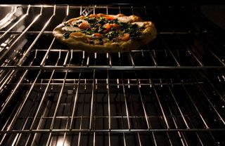 Baking a frozen pizza in the oven
