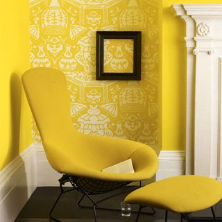 living room with printed yellow walls
