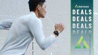 Man running wearing GPS watch