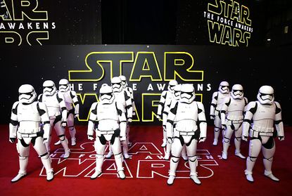 Stormtroopers arrive at the European premiere of The Force Awakens.