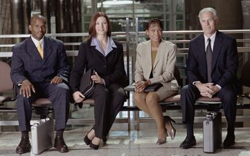 Businesspeople sitting in lobby