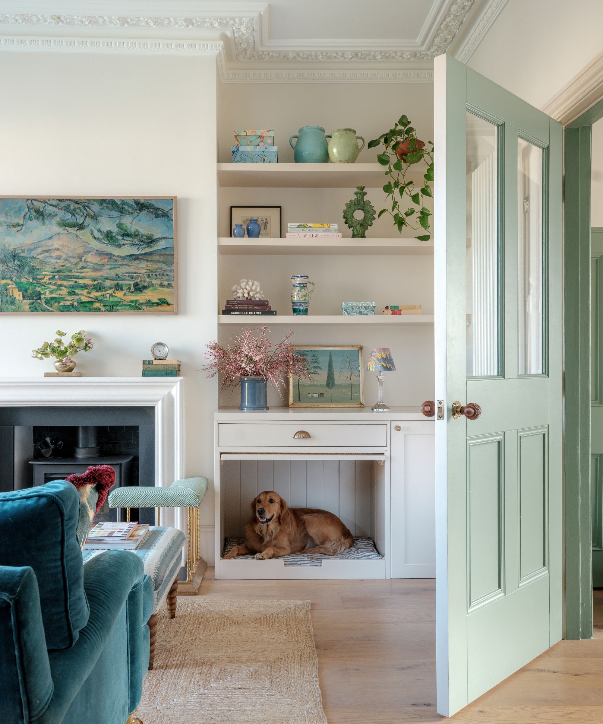 a custom dog bed built into a living room alcove in a London home by Laura Stephens