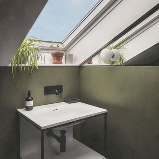 loft bathroom in the eaves with slanted walls