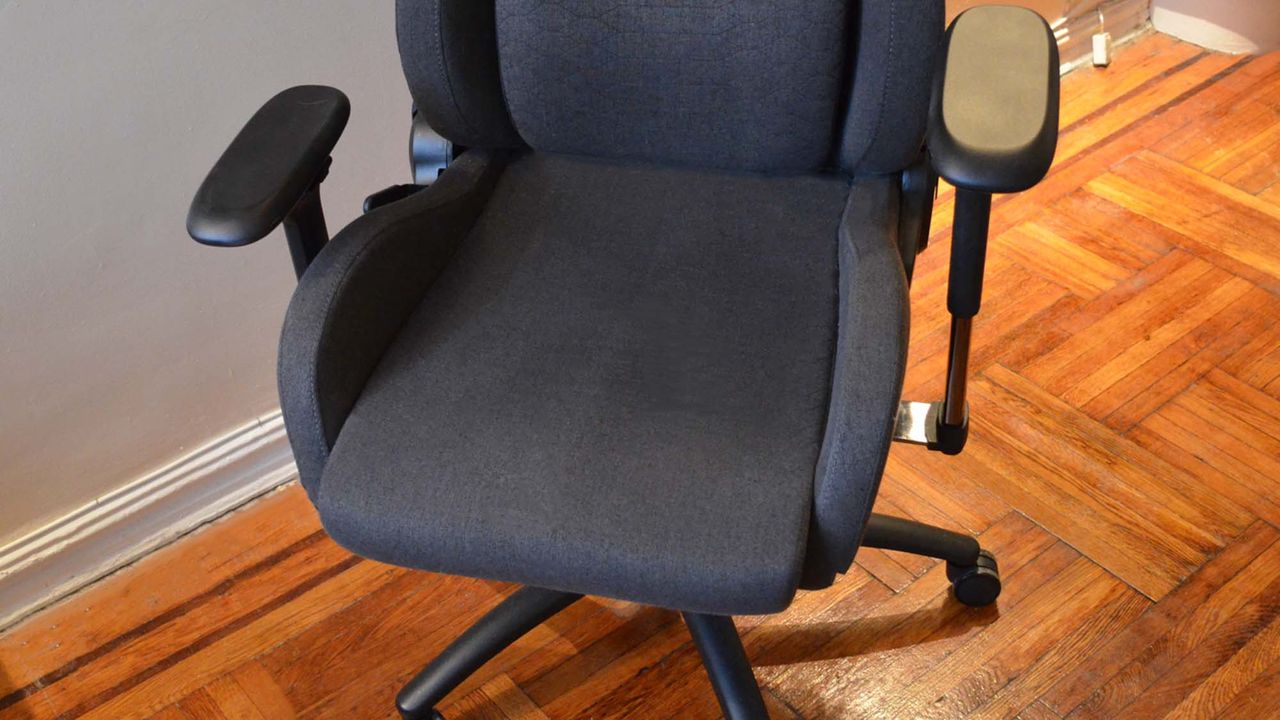 A Razer Iskur Fabric gaming chair in a living room