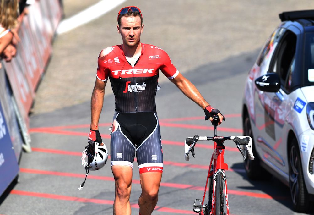 Edward Theuns walks to the finish after crashing in the finish of stage 1 at the Belgium Tour.