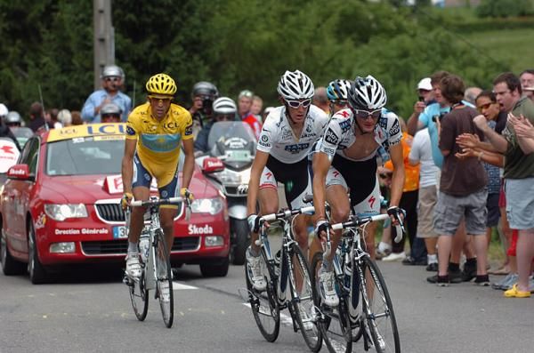 Fr&auml;nk and Andy Schleck lead race leader Alberto Contador on the Col de la Colombi&egrave;re.