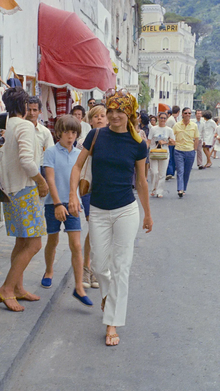 Jackie Kennedy Onassis in different late '60s
 and '70s-era summer staples.