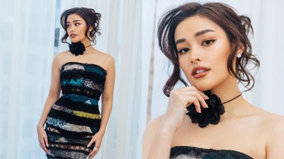 Liza Soberano posing in front of a window wearing a black, blue, and green strapless dress by Olivier Theyskens