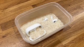 AirPods Pro in a tub of rice