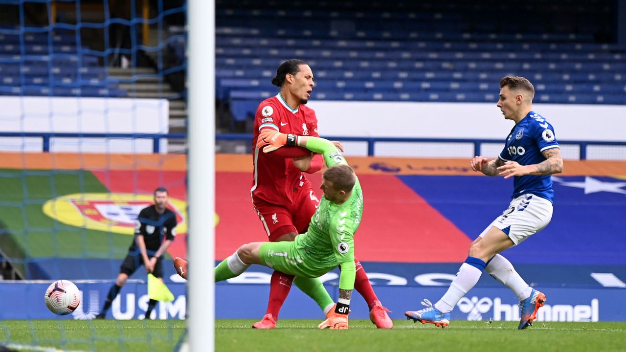 Liverpool star Virgil van Dijk was injured following this tackle by Everton goalkeeper Jordan Pickford