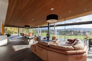 Interior timber clad ceiling in the living area of this self build