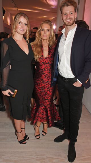 Lady Kitty Spencer, mother Victoria Aitken and brother Louis Spencer, Viscount Althorp, attend Tatler's English Roses 2017 in association with Michael Kors at the Saatchi Gallery on June 29, 2017 in London, England.
