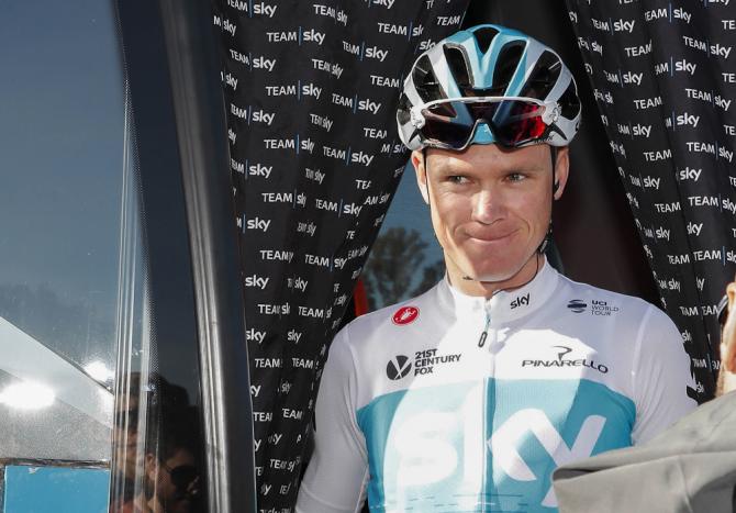 Chris Froome emerges from the Team Sky bus ahead of stage 1 at Ruta del Sol