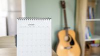 Calendar desk place on table. Desktop Calender for Planner to plan agenda, timetable, appointment, organization, management each date, month, and year on wooden office table.Calendar Concept.