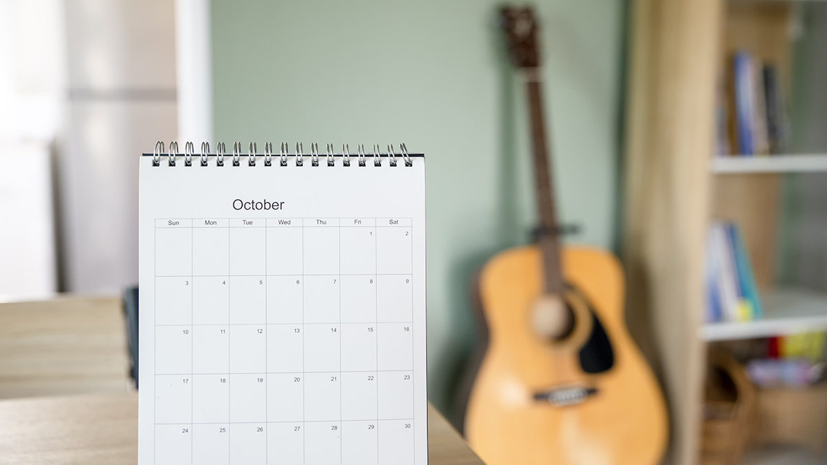 Calendar desk place on table. Desktop Calender for Planner to plan agenda, timetable, appointment, organization, management each date, month, and year on wooden office table.Calendar Concept.