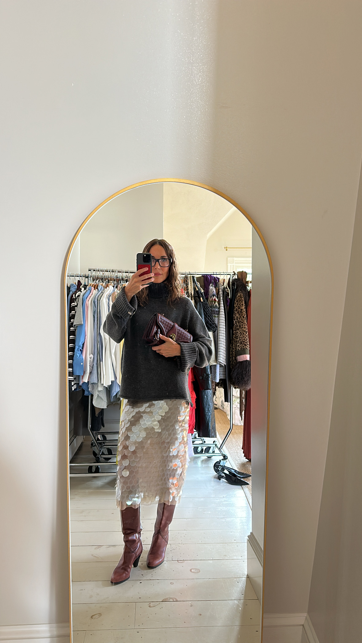 Larissa Mills with a vintage designer bag