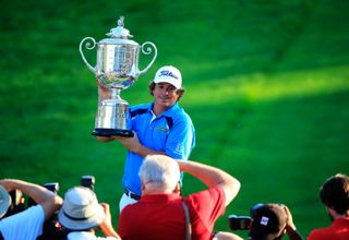 Dufner holds the PGA Championship trophy after his win in 2013