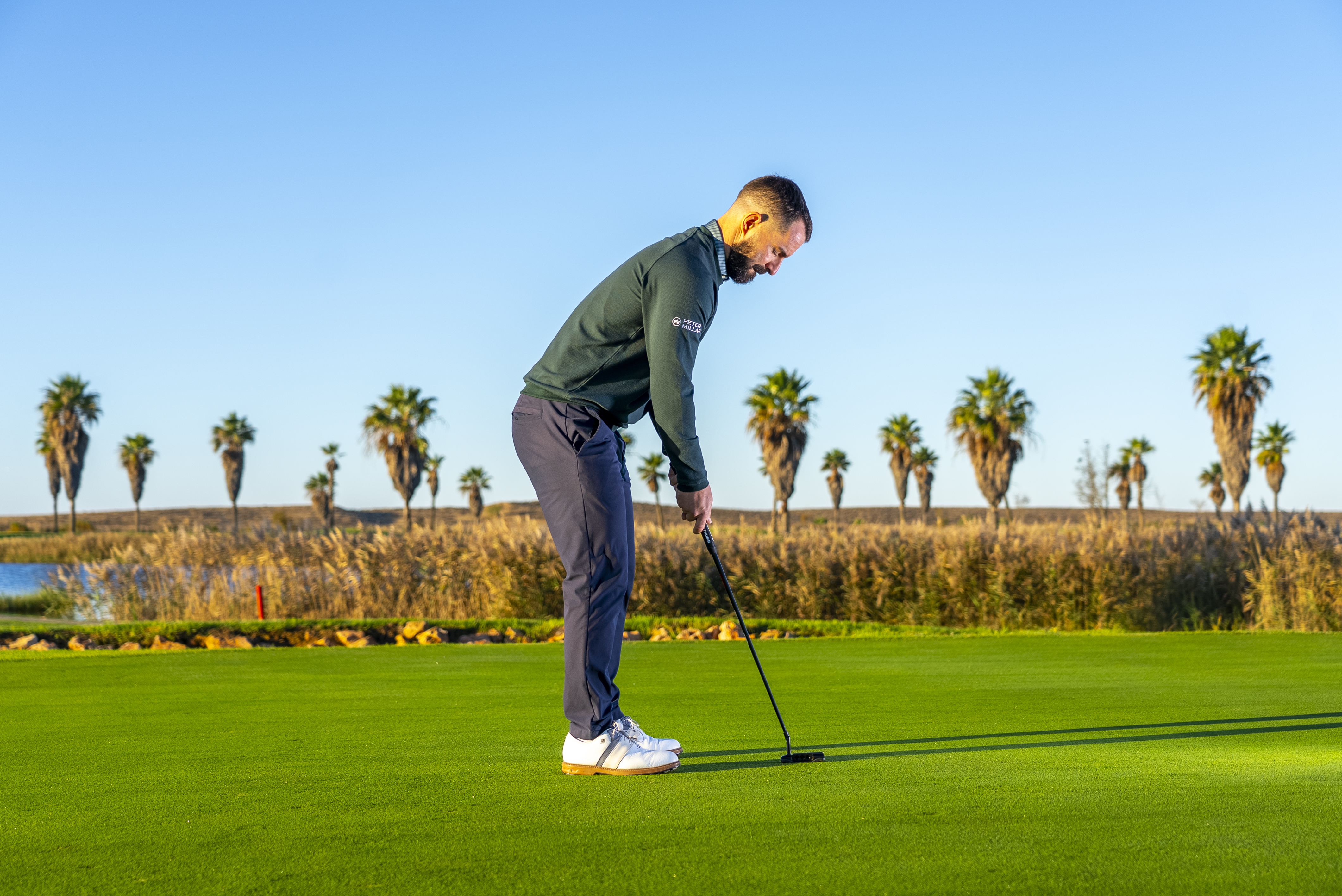 Putting Specialist Coach James Jankowksi demonstrating the correct setup position and posture for better putting