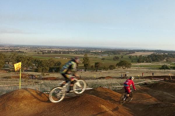 Riders speed down Mt.Major during the men's four cross.