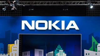 The Nokia sign displayed on a blue banner at a conference