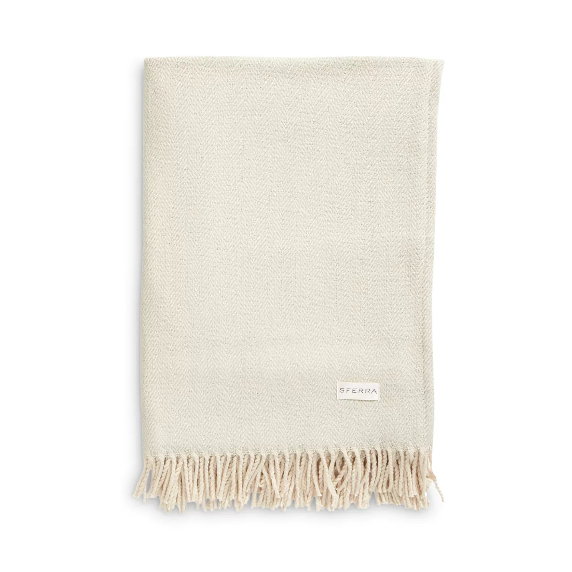 Cream herringbone throw with tassels