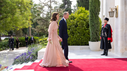 Kate stuns in a recycled blue lace dress by Elie Saab alongside