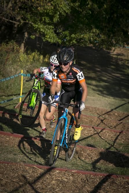 Amanda Miller rides the stairs ahead of the Sam Schneider