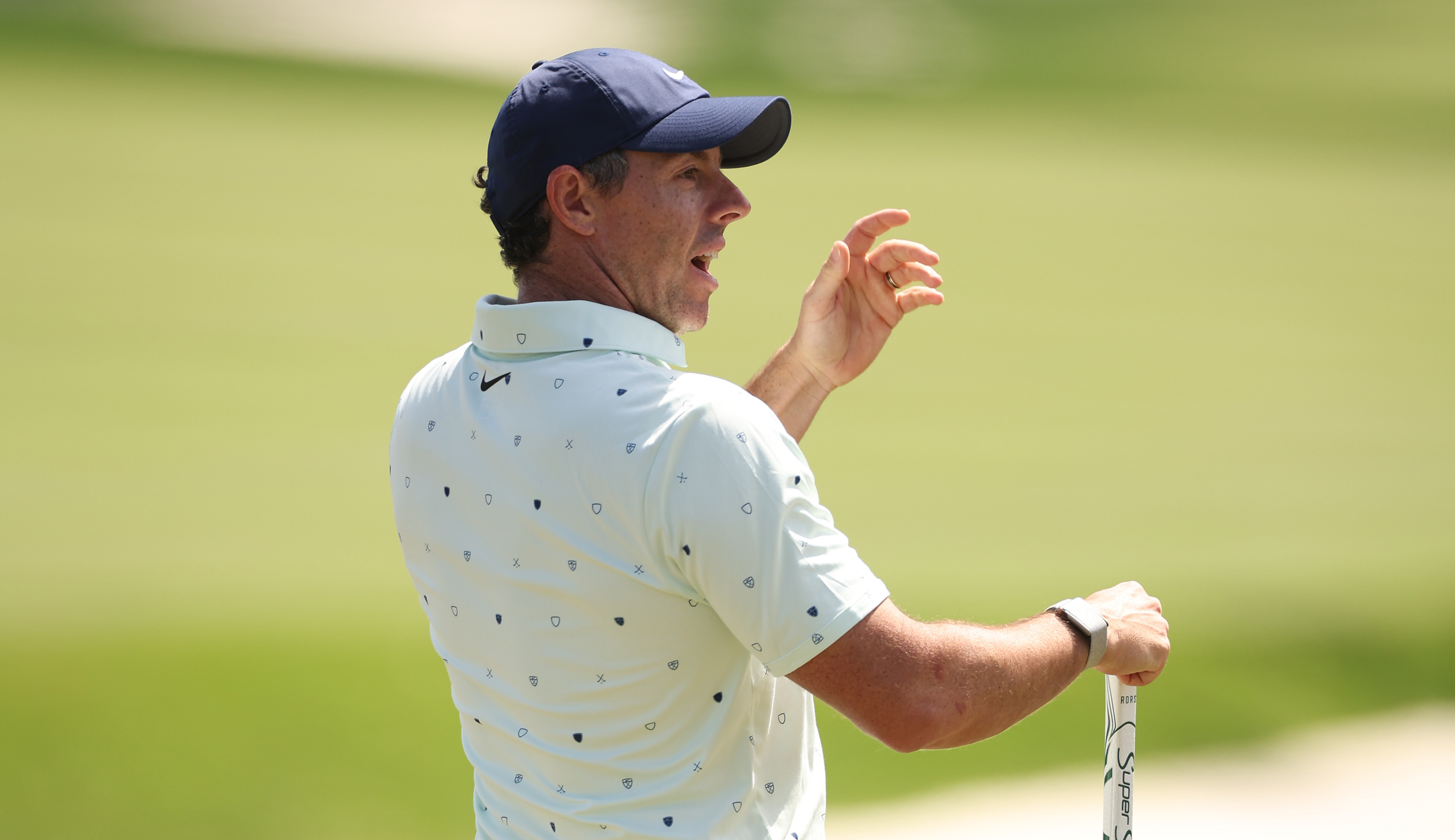 Rory McIlroy reacts to a shot